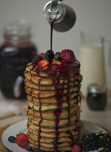 elderberry syrup poured on pancakes