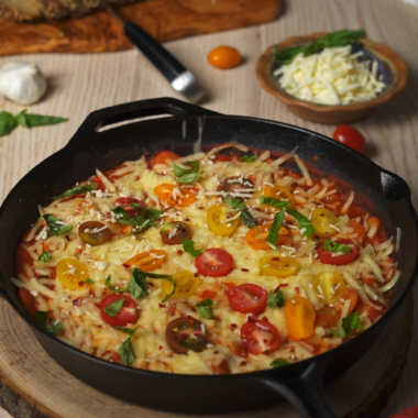 Sprinkling Cheese on Pizza Beans