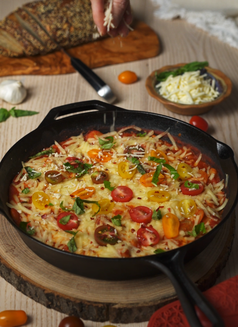 Sprinkling Cheese on Pizza Beans