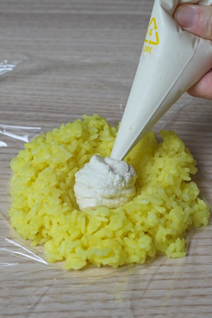 Filling rice ball with tofu puree