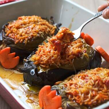 Eating orzo stuffed eggplant.