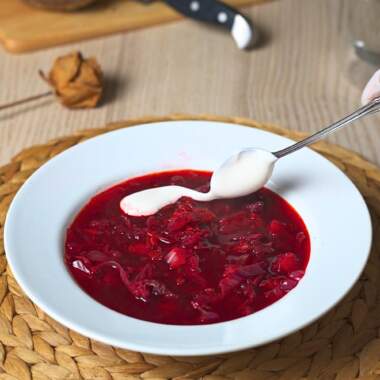Serving vegan borscht.